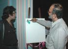 Bikash Ranjan bhattacharyya tries his hand at painting while Wasim Kapoor looks on