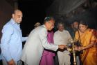 Chief patron,Shri RA Jalan lighting the cremonial lamp while others look on