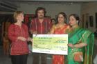 Presentation of cheque on behalf of Jagriti Art  to  RI - 3291